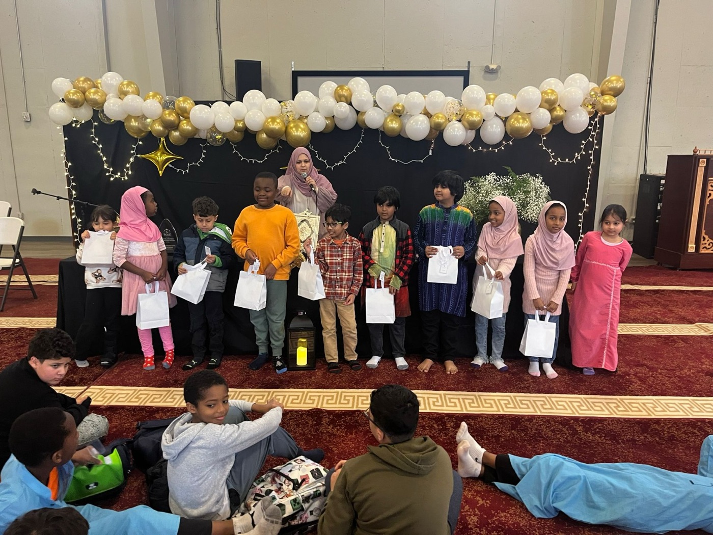 ICCSC Sunday School students from many backgrounds gathered at the year-end celebration